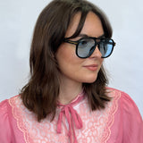Oversized Navigator Sunglasses in Black with Blue Lenses