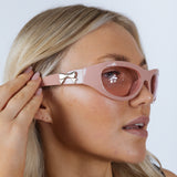 Wrap Around Racer Bow Sunglasses in Pink