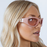 Wrap Around Racer Bow Sunglasses in Pink