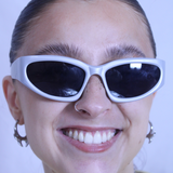 Silver racer style sunglasses with black lenses