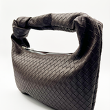SVNX Woven PU leather grab bag with knotted strap detail in dark oak