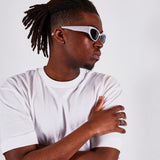 Silver racer style sunglasses with black lenses