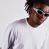 Silver racer style sunglasses with black lenses