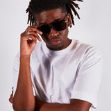 Tortoiseshell navigator sunglasses with green lenses