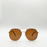 Oversized rounded aviator style sunglasses with brown lenses