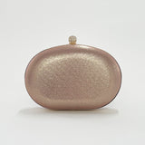 Gold Oval Clutch Bag with Pink Stones