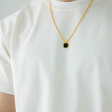 SVNX Gold Chain with Black Pendant