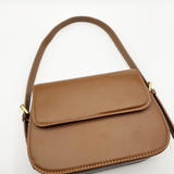 Rounded Cross Body Bag in Brown