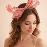 Bow Shaped Fascinator with Sinamay Curls & Feathers in Pink - svnx