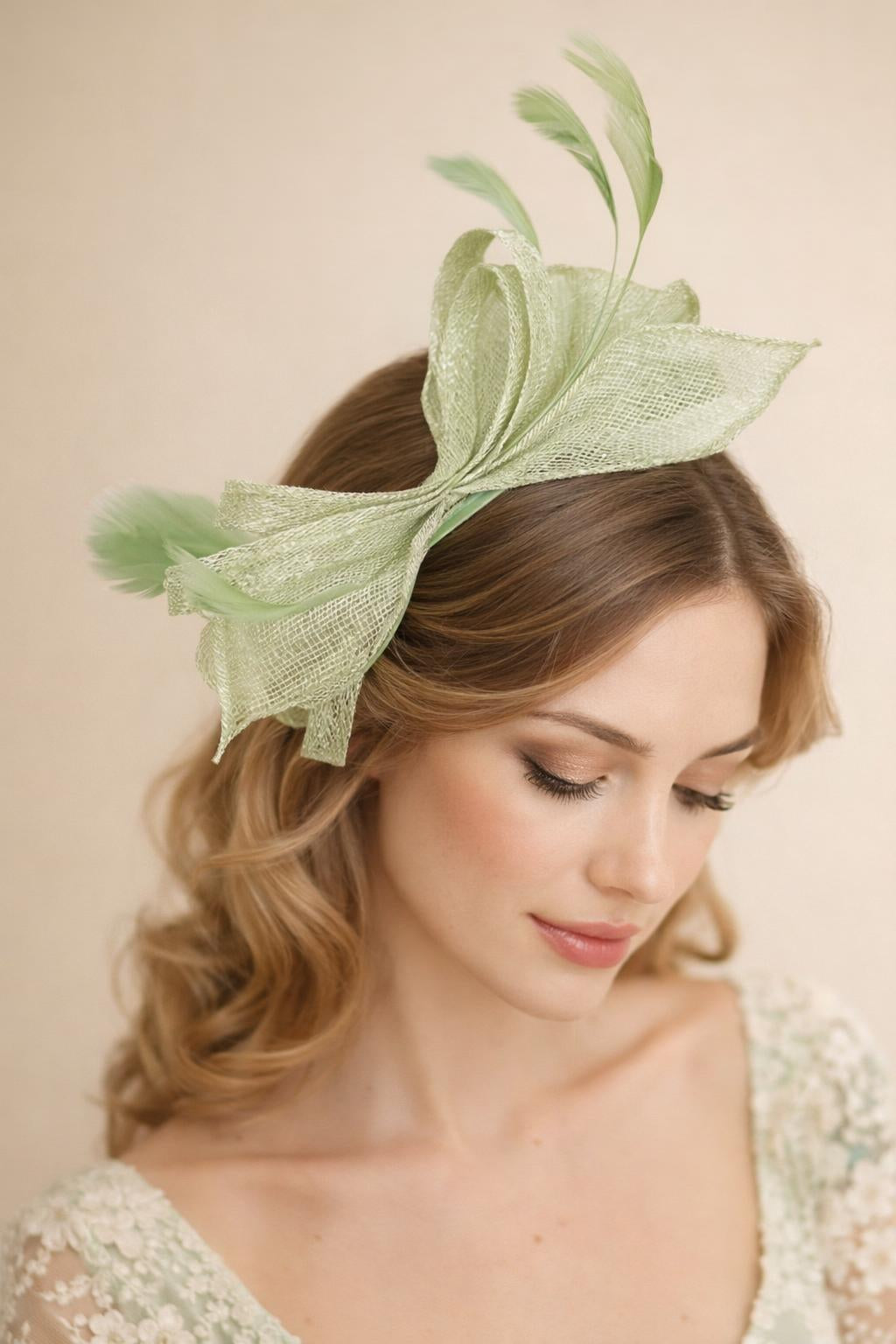 Bow Shaped Fascinator with Sinamay Curls & Feathers in Pastel Green - svnx