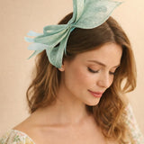 Bow Shaped Fascinator with Sinamay Curls & Feathers in Mint Blue - svnx