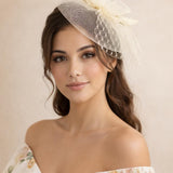 Floral Fascinator  with Veil Detail in Cream
