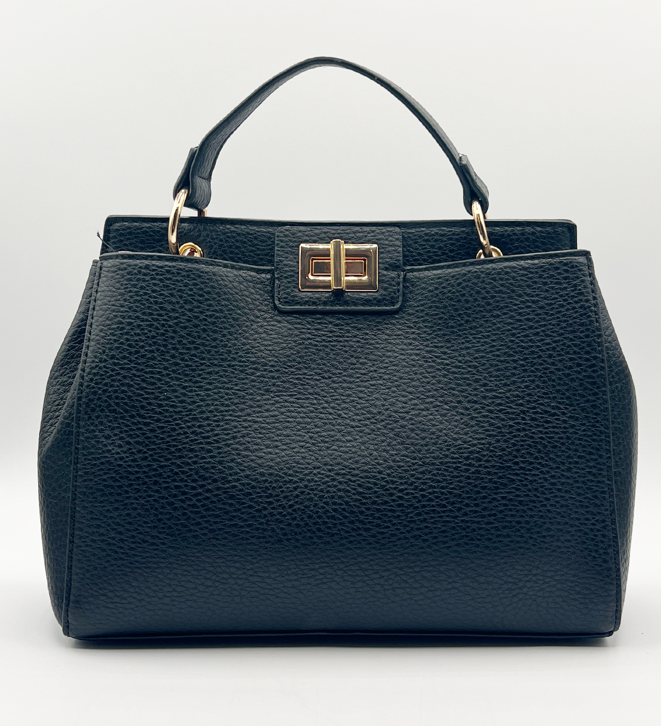 Black faux leather handbag with gold trim - svnx