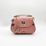 Embroidered Shoulder Bag With Zip Charms in Pink