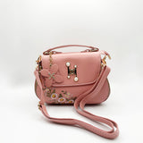 Embroidered Shoulder Bag With Zip Charms in Pink