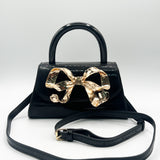 Metallic Bow Top Handle Bag in Black