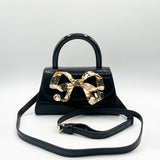 Metallic Bow Top Handle Bag in Black