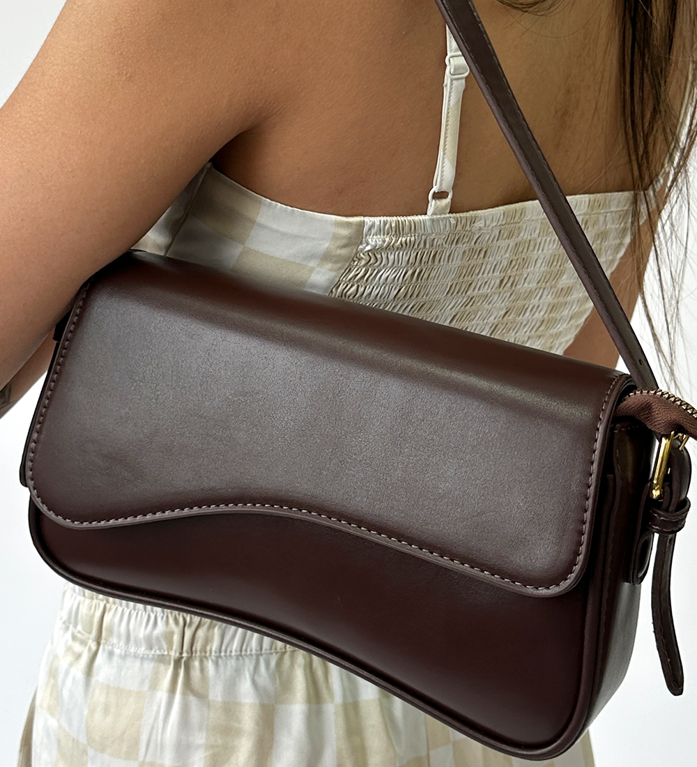 Curved Baguette Bag in Dark Brown - svnx