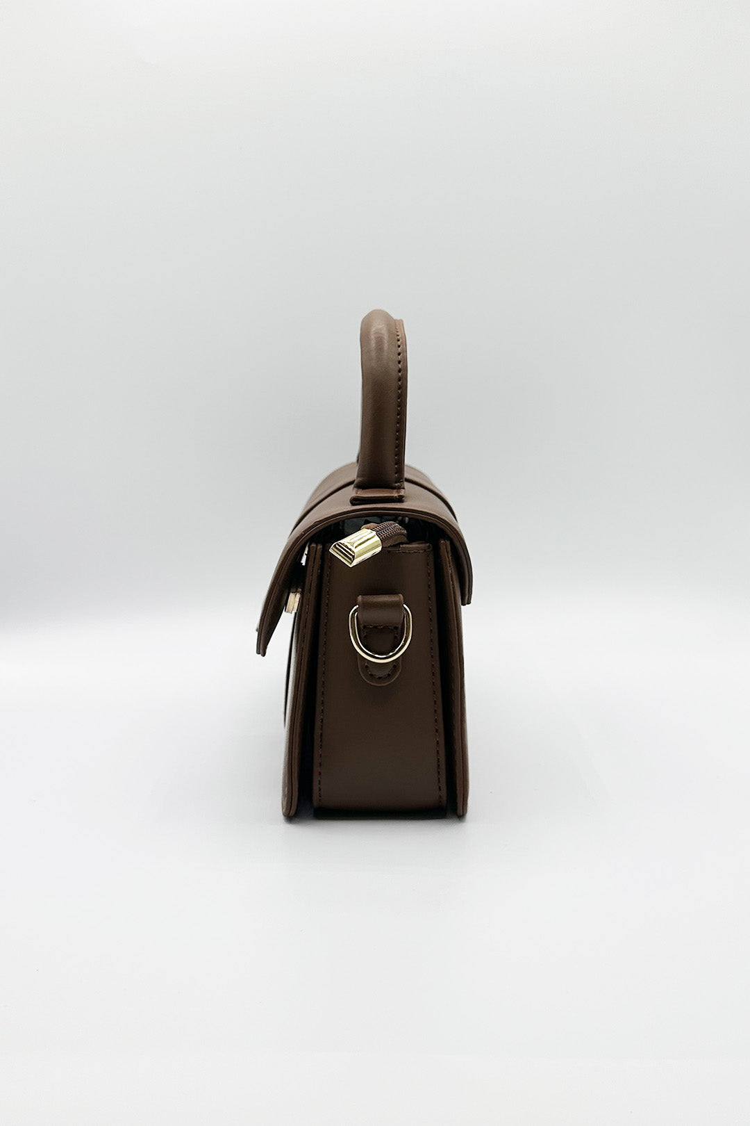 Small Crossbody Hard Top Handle Bag in Brown - svnx