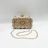 Embellished Heart Clutch Bag In Gold
