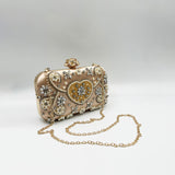 Embellished Heart Clutch Bag In Gold