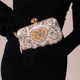 Embellished Heart Clutch Bag In Gold