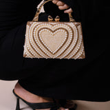 Heart Pearl Clutch Bag In Gold