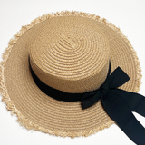 Straw Hat With Black Ribbon Bow