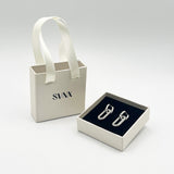 Ribbed Oval Hoop Earrings in Silver - svnx