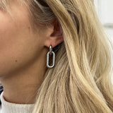 Ribbed Oval Hoop Earrings in Silver - svnx