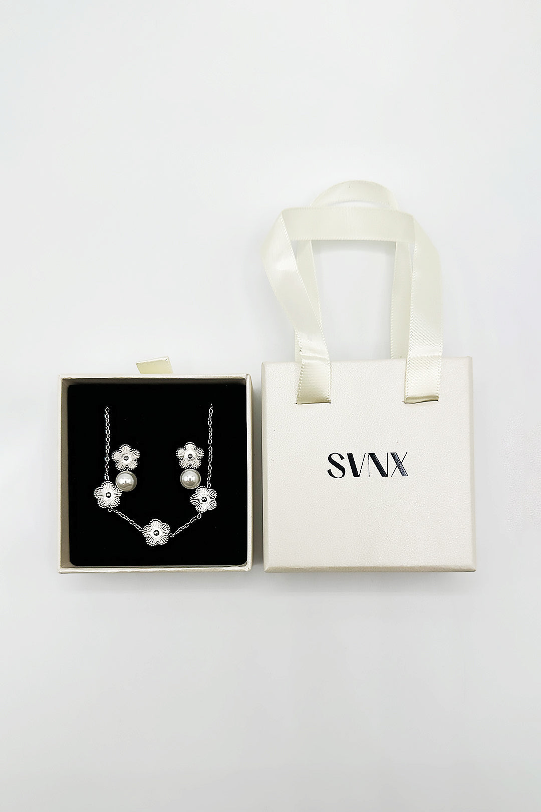 Floral Pearl Stud Earrings & Bracelet in Silver - svnx