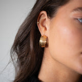 Chunky hoop earrings in gold with inprinted texture