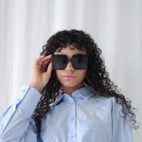 Oversized square sunglasses with temple frame detail