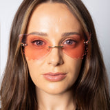 Frameless pink butterfly sunglasses