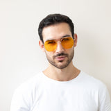 Oversized rounded aviator style sunglasses with yellow lenses