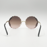 Oversized Round Frameless Sunglasses with Crystal Detail in Brown - svnx