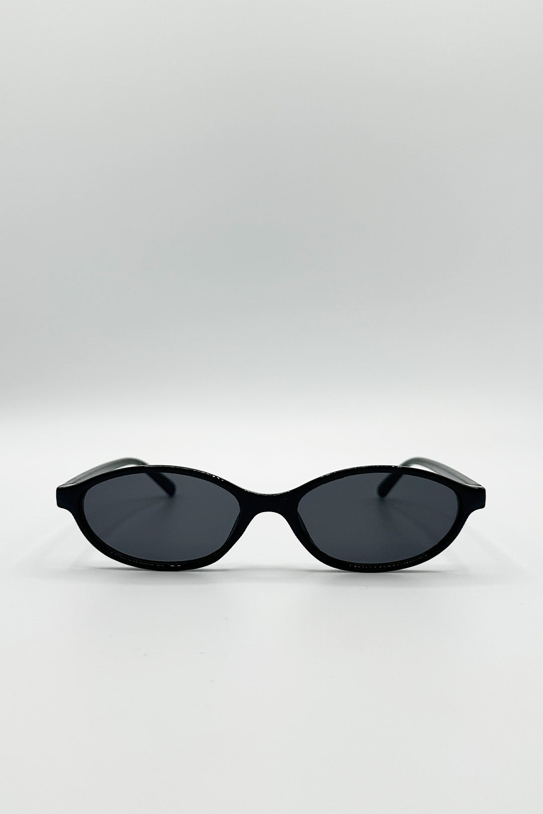 Oval Sunglasses In Black - svnx