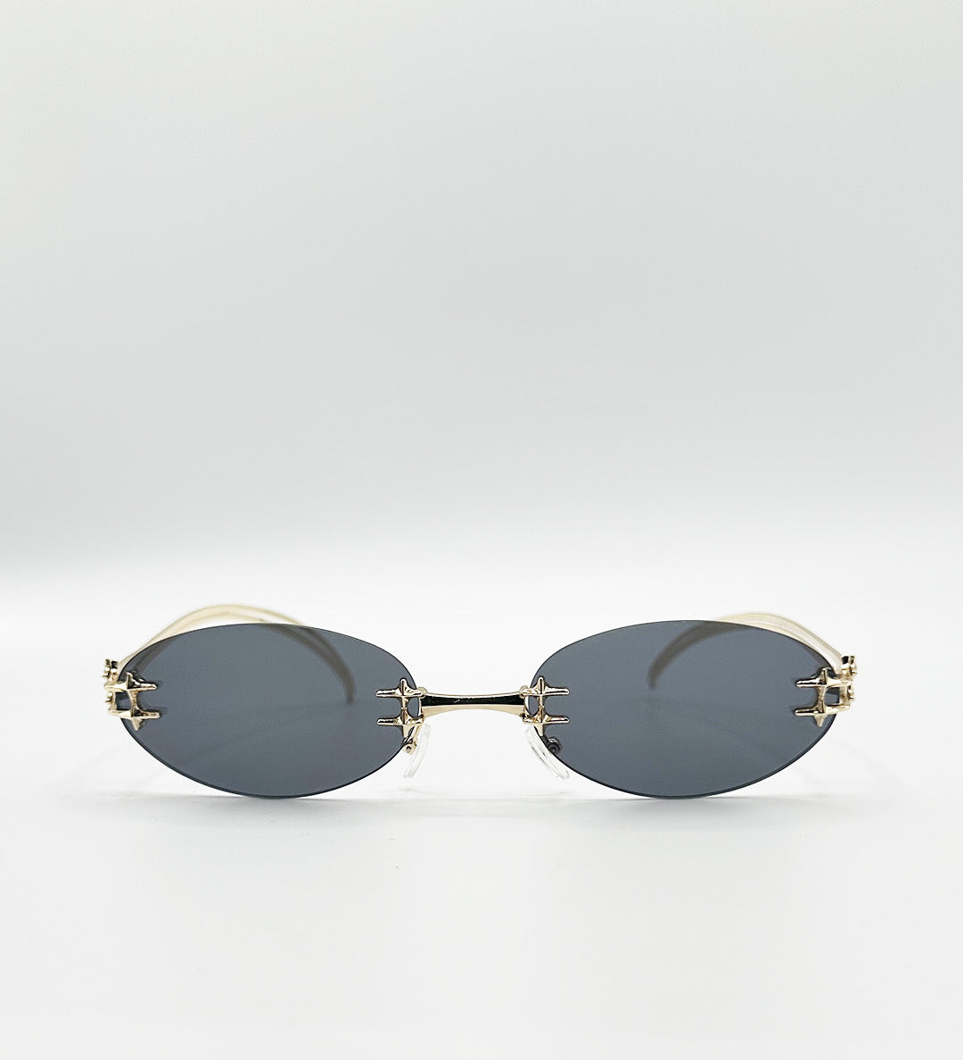 Rimless Oval Sunglasses In Black - svnx