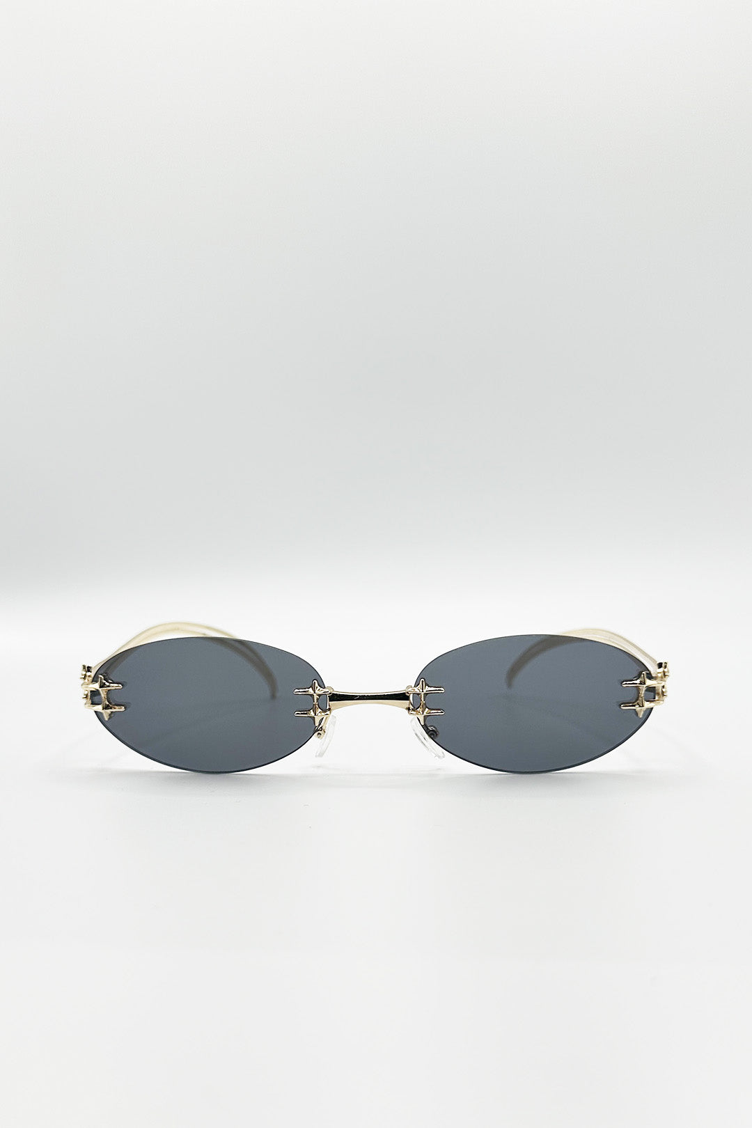 Rimless Oval Sunglasses In Black - svnx