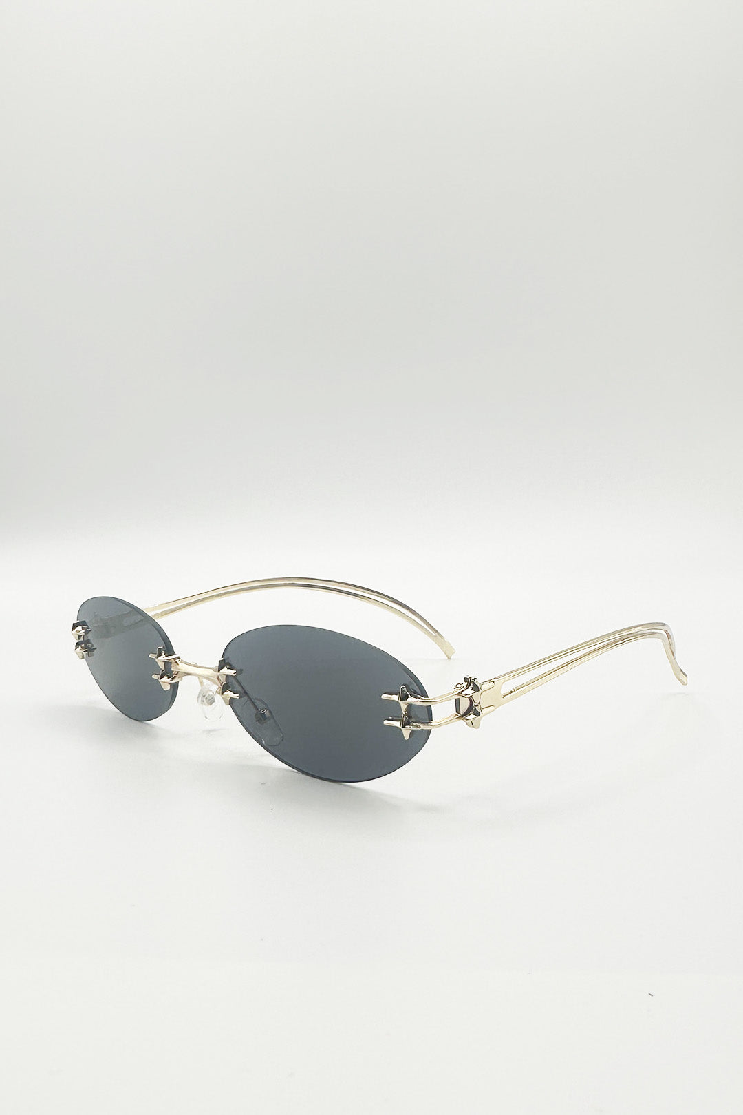 Rimless Oval Sunglasses In Black - svnx