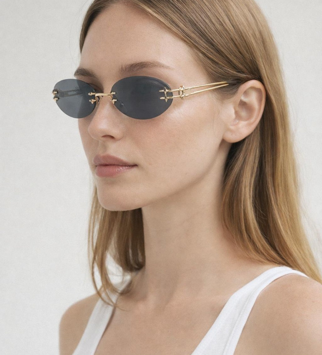 Rimless Oval Sunglasses In Black - svnx