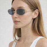 Rimless Oval Sunglasses In Black - svnx