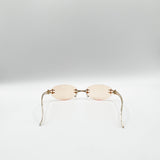 Rimless Oval Sunglasses In Brown