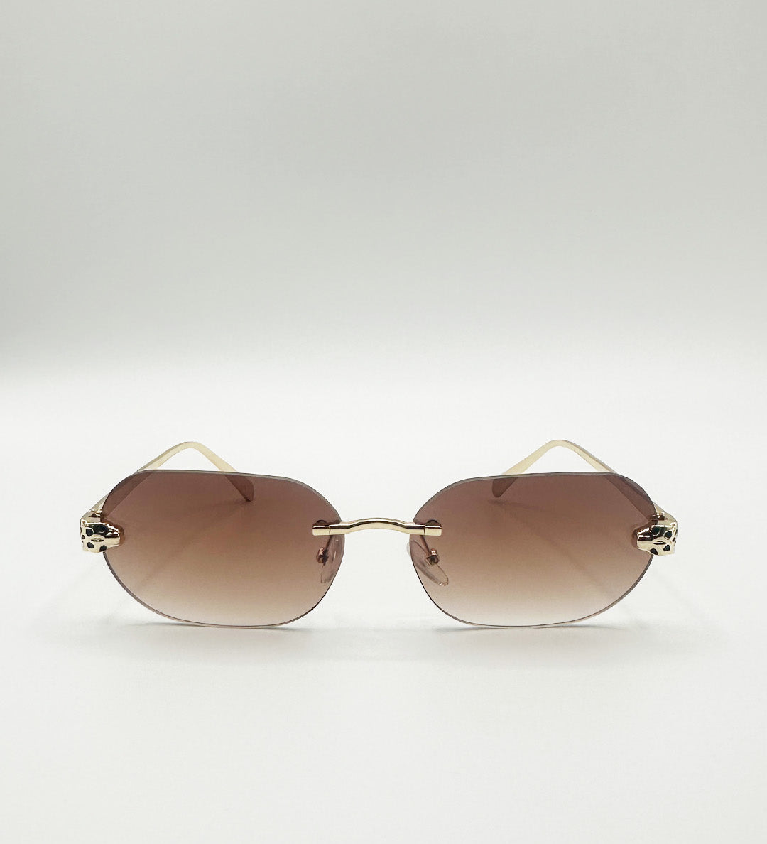 Jaguar Detail Rimless Sunglasses In Brown - svnx