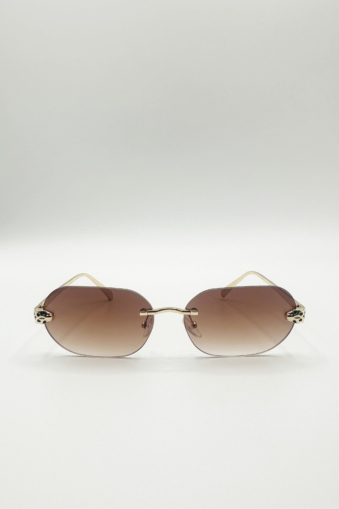 Jaguar Detail Rimless Sunglasses In Brown - svnx