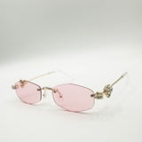 Rimless Oval Diamante Sunglasses In Pink - svnx