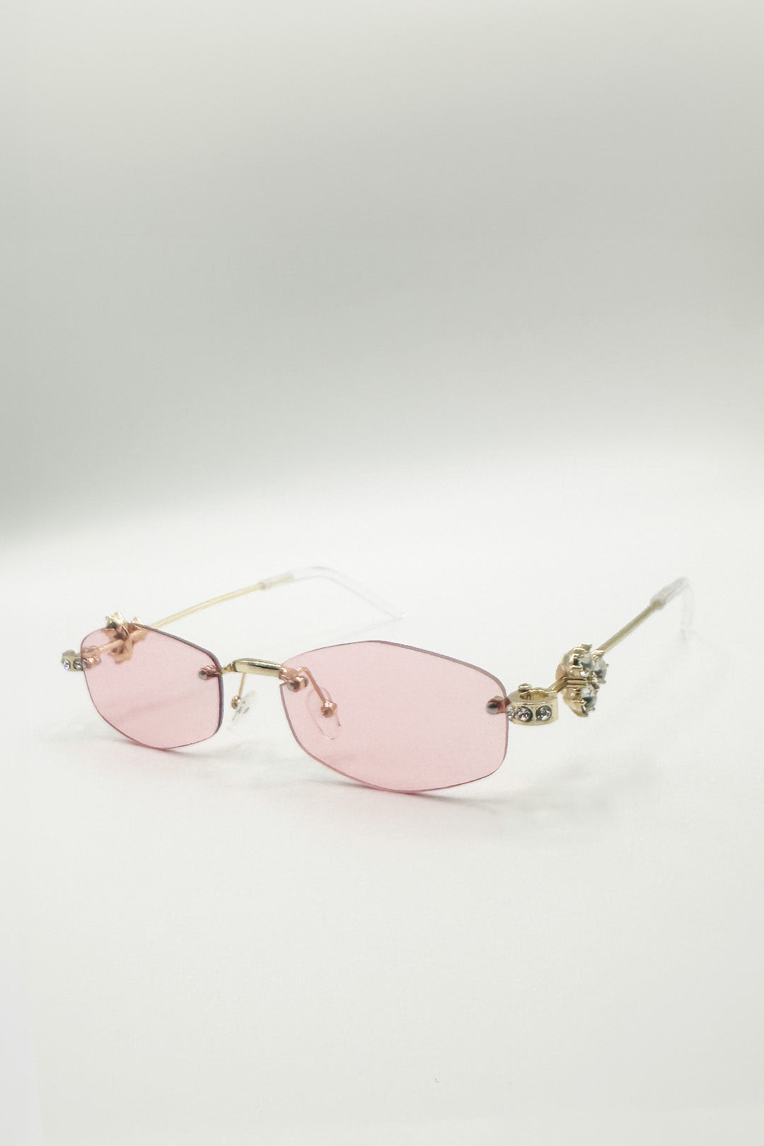 Rimless Oval Diamante Sunglasses In Pink - svnx