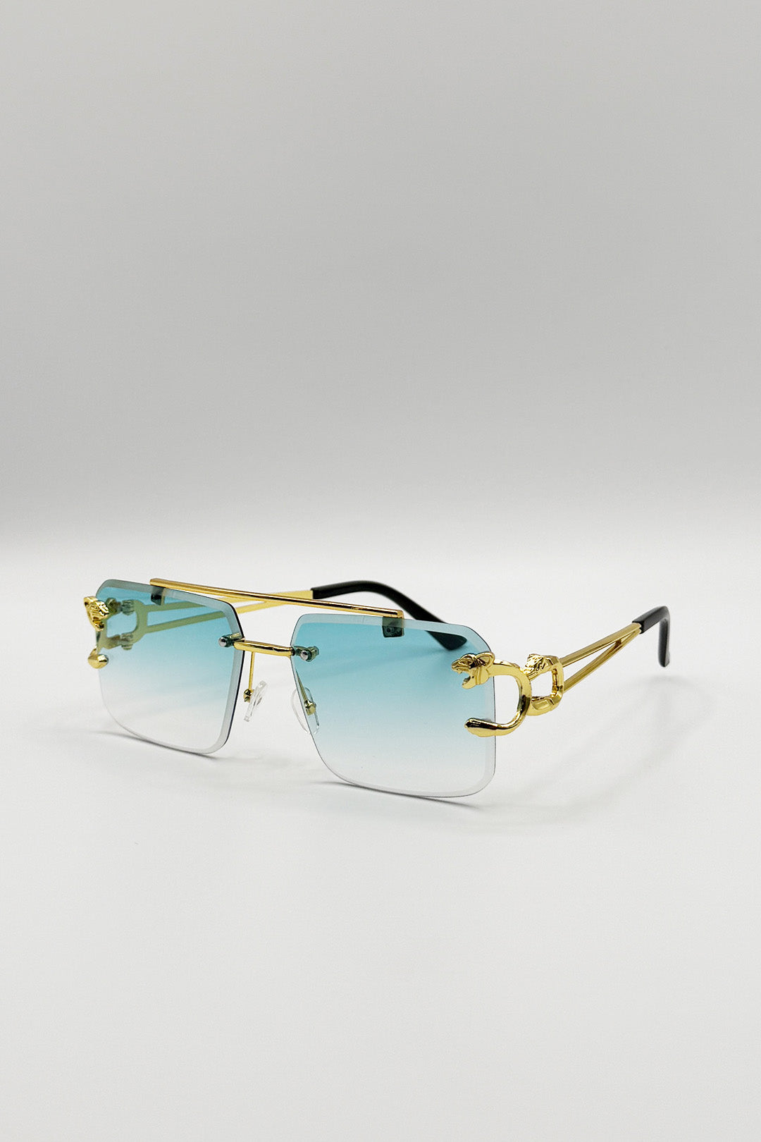 Rimeless Navigator With Side Detail Sunglasses In Blue - svnx