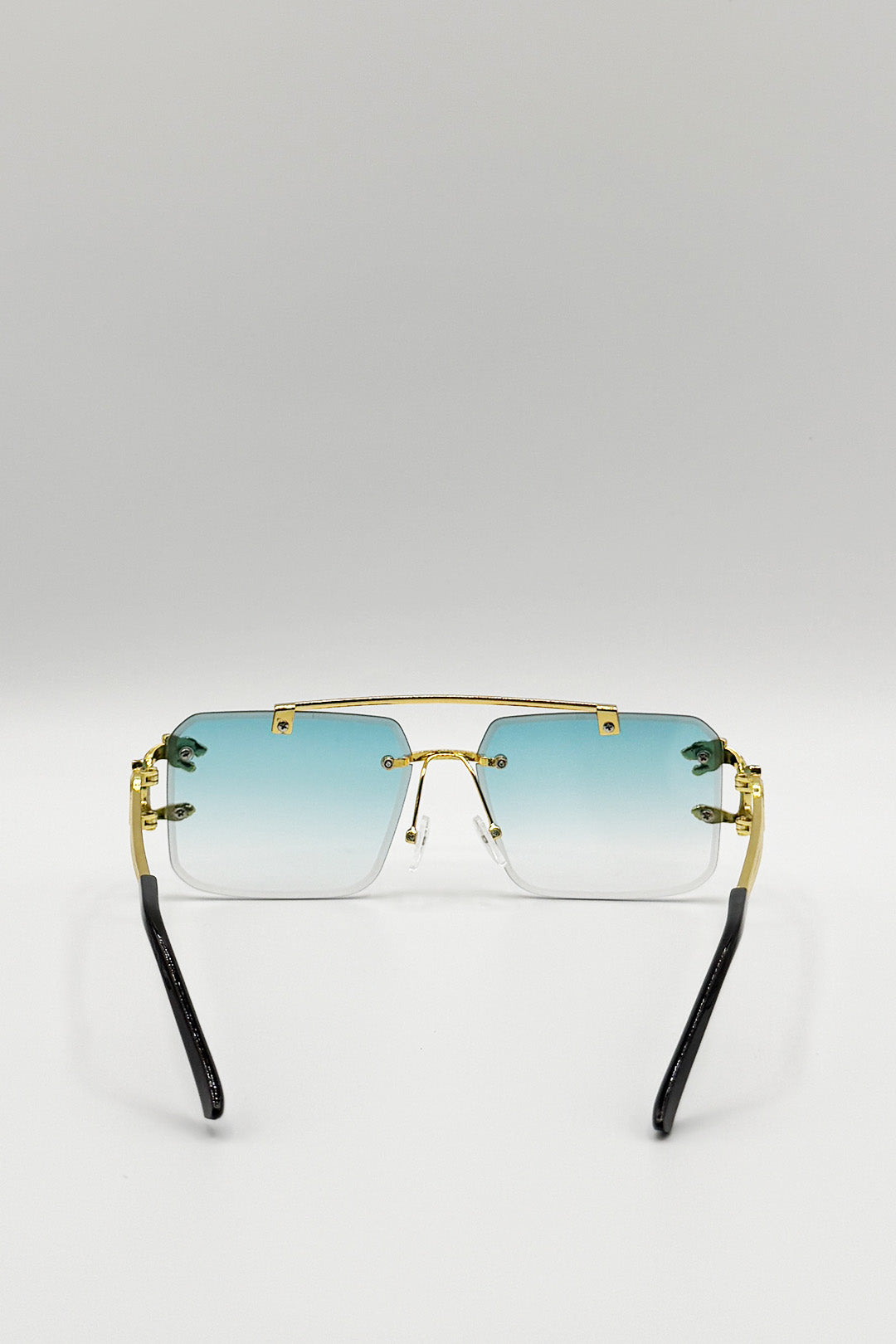Rimeless Navigator With Side Detail Sunglasses In Blue - svnx