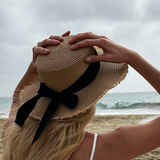 Straw Hat With Black Ribbon Bow